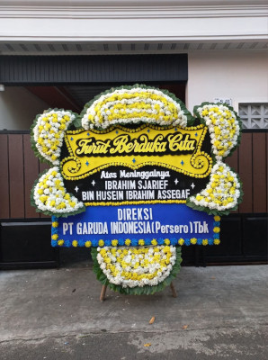 Papan Bunga Duka di Doufo