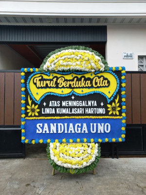 Papan Bunga Duka di Doufo