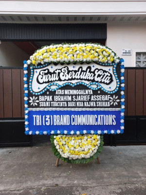 Papan Bunga Duka di Doufo